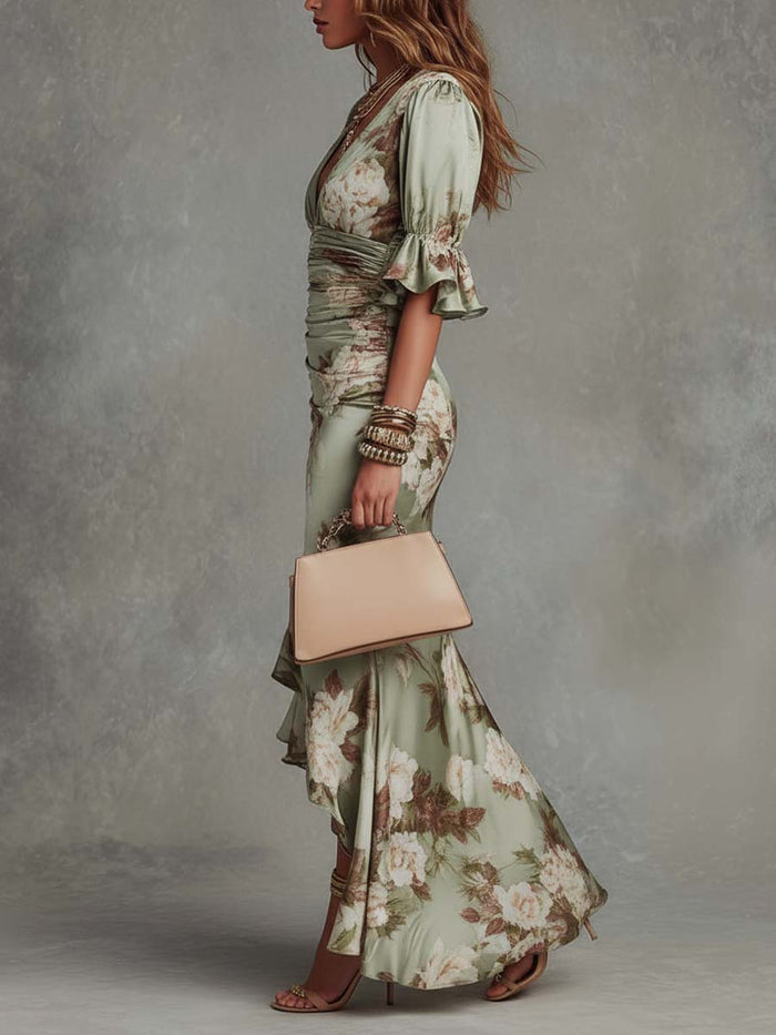 Anna - Asymmetrical long dress in green satin with V-neck, flared ruffled sleeves, and floral pattern