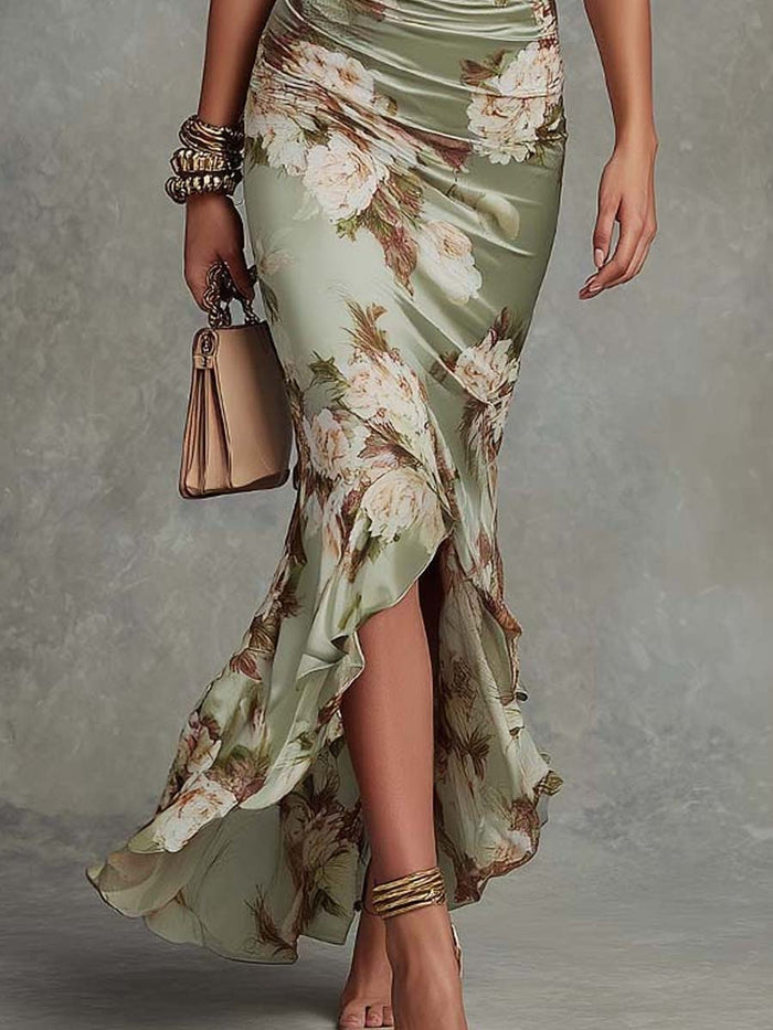 Anna - Asymmetrical long dress in green satin with V-neck, flared ruffled sleeves, and floral pattern