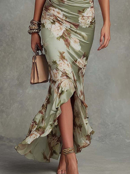 Anna - Asymmetrical long dress in green satin with V-neck, flared ruffled sleeves, and floral pattern