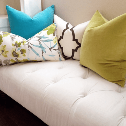 Turquoise Velvet, Kudzu Floral, Riad Clove, & Apple Green Performance Velvet Custom Designer Pillow combo on sofa | Arianna Belle