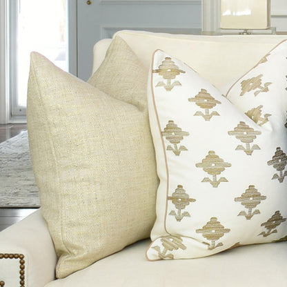 Shimmer Beige and Gold Luxury Pillow Paired with the Rubia Embroidery Natural Designer Pillow on Beige Sofa | Arianna Belle Shop